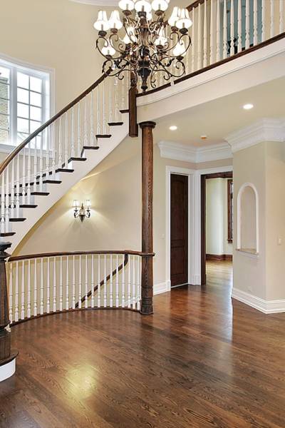 Spiral Custom hardwood stairs installation in Kansas City